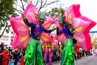 Carnival stilt walkers